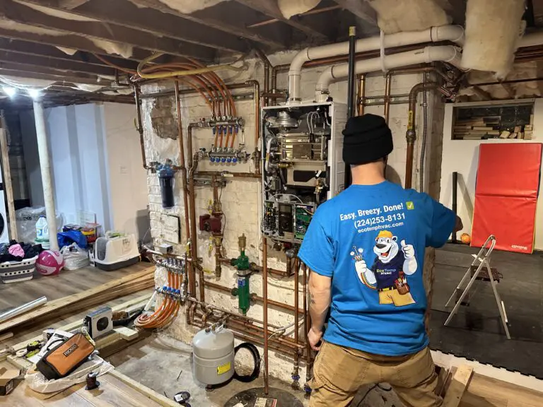 HVAC technician installing a tankless water heater