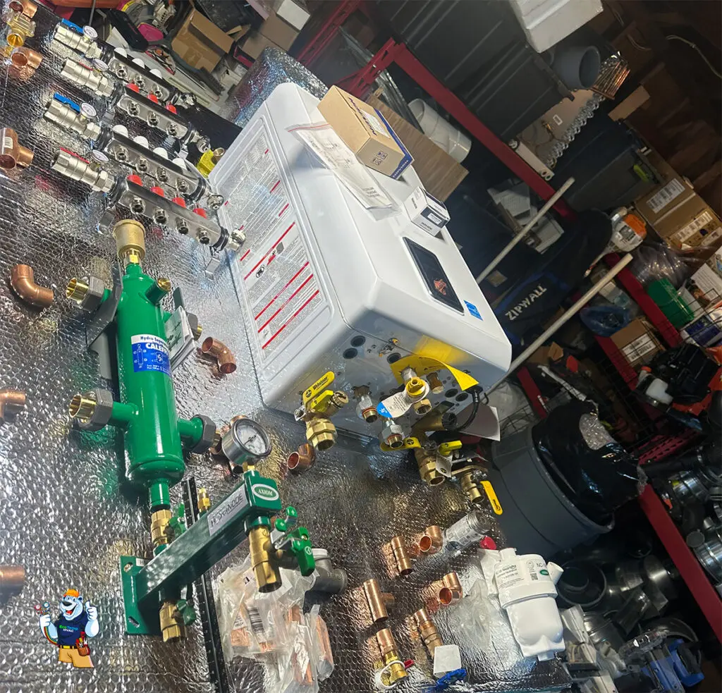 Navien boiler installation preparation with all components, pipes, and connections organized on a table, ready for setup.