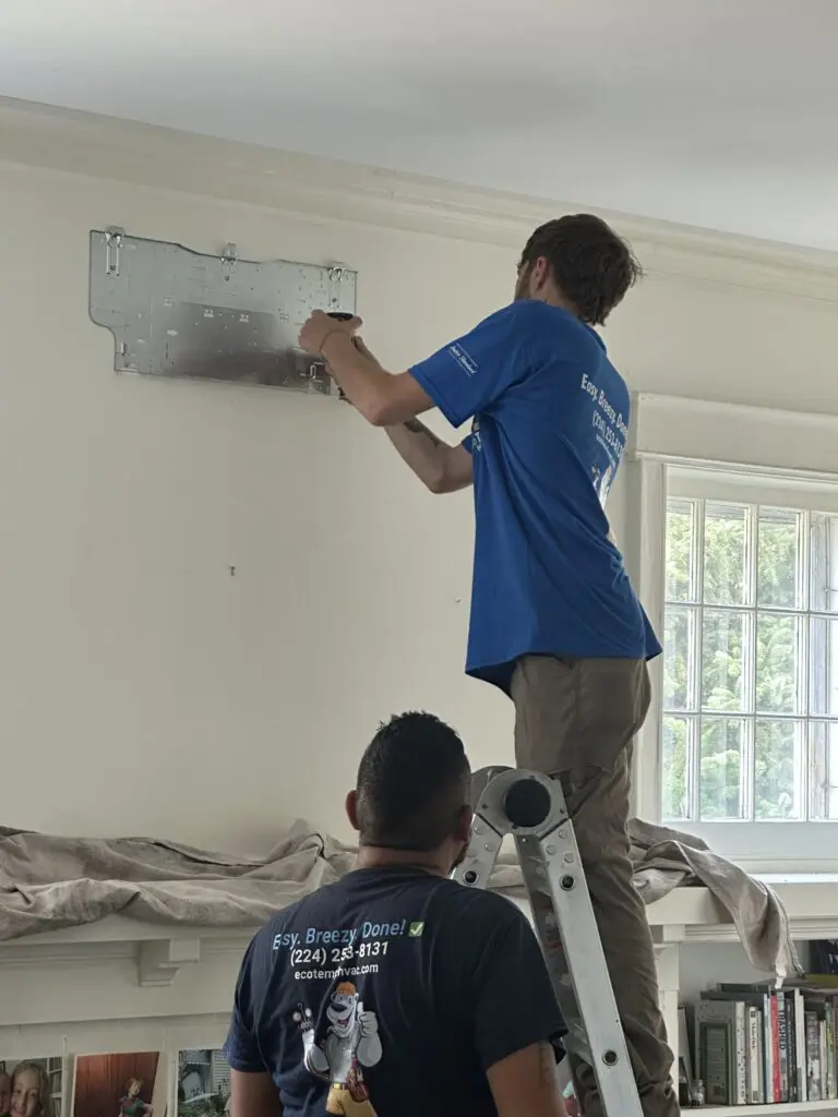 Eco Temp HVAC technicians installing a ductless mini split system in a St. Charles, IL home.